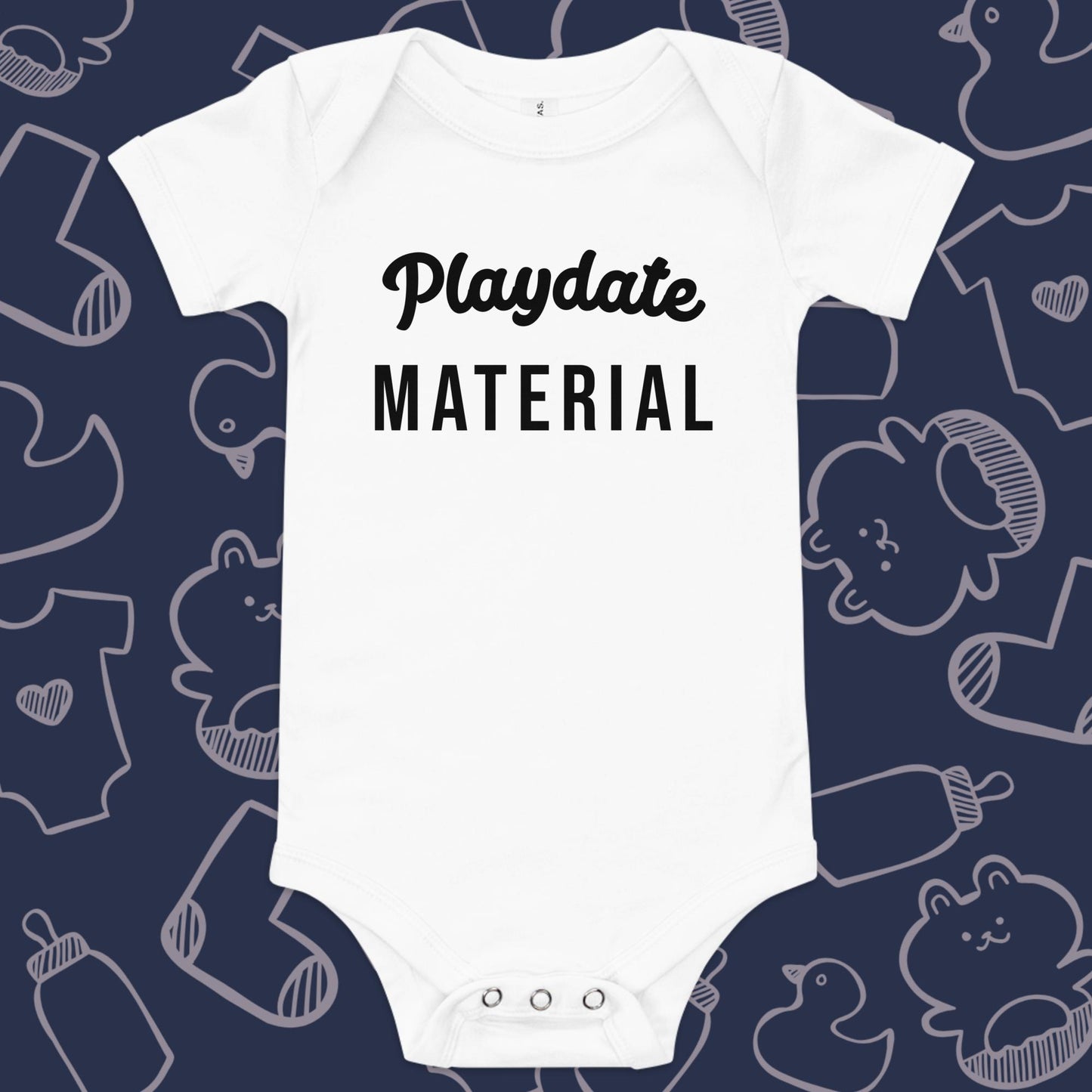 Funny, white baby onesie featuring the playful text "PLAYDATE MATERIAL" against a whimsical, blue backdrop of ducks, socks, stuffed animals, baby bodysuits, and bottles