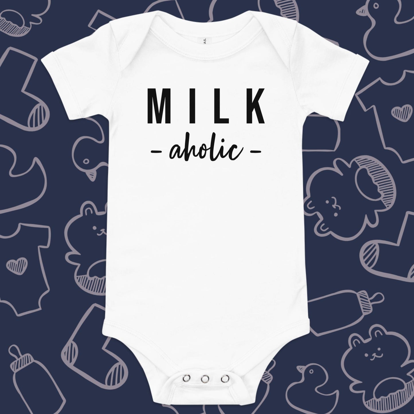 Funny, white baby onesie featuring the playful text "MILK AHOLIC" against a whimsical, blue backdrop of ducks, socks, stuffed animals, baby bodysuits, and bottles