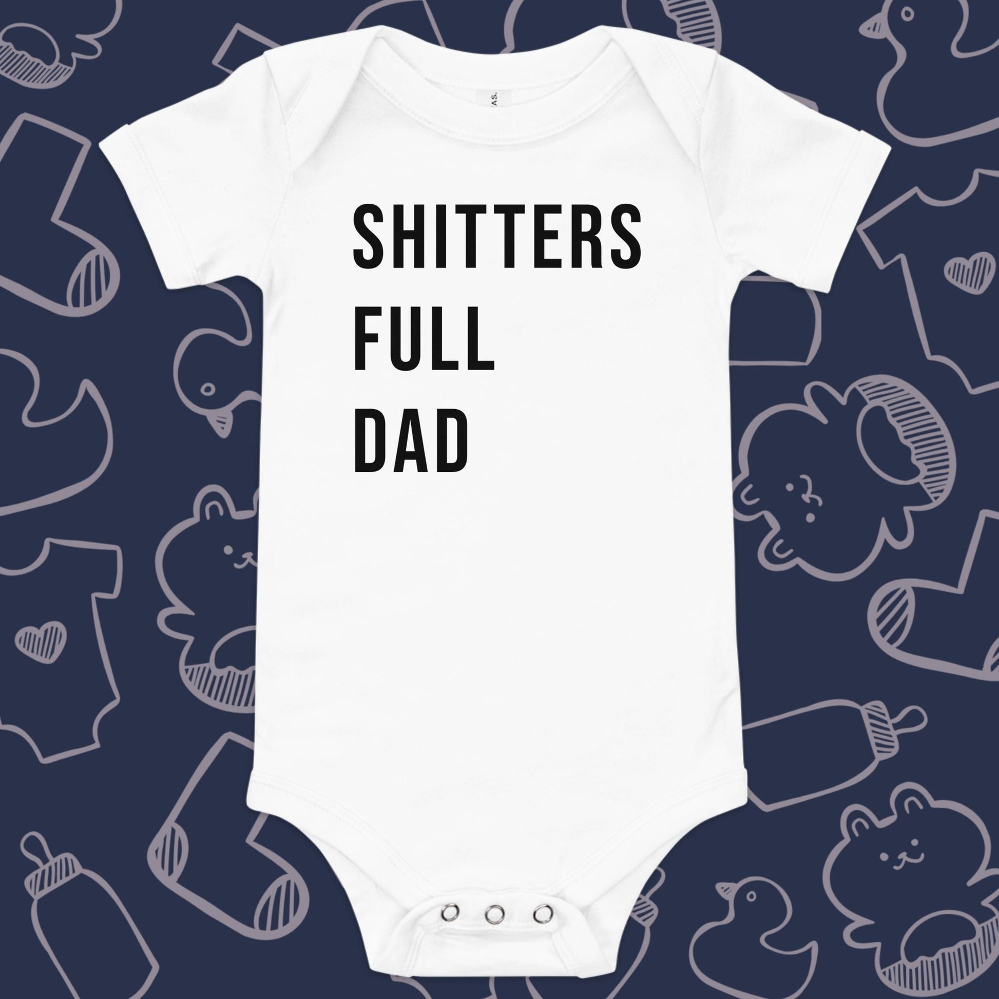 Funny, white baby onesie featuring the playful text "SHITTERS FULL DAD" against a whimsical, blue backdrop of ducks, socks, stuffed animals, baby bodysuits, and bottles