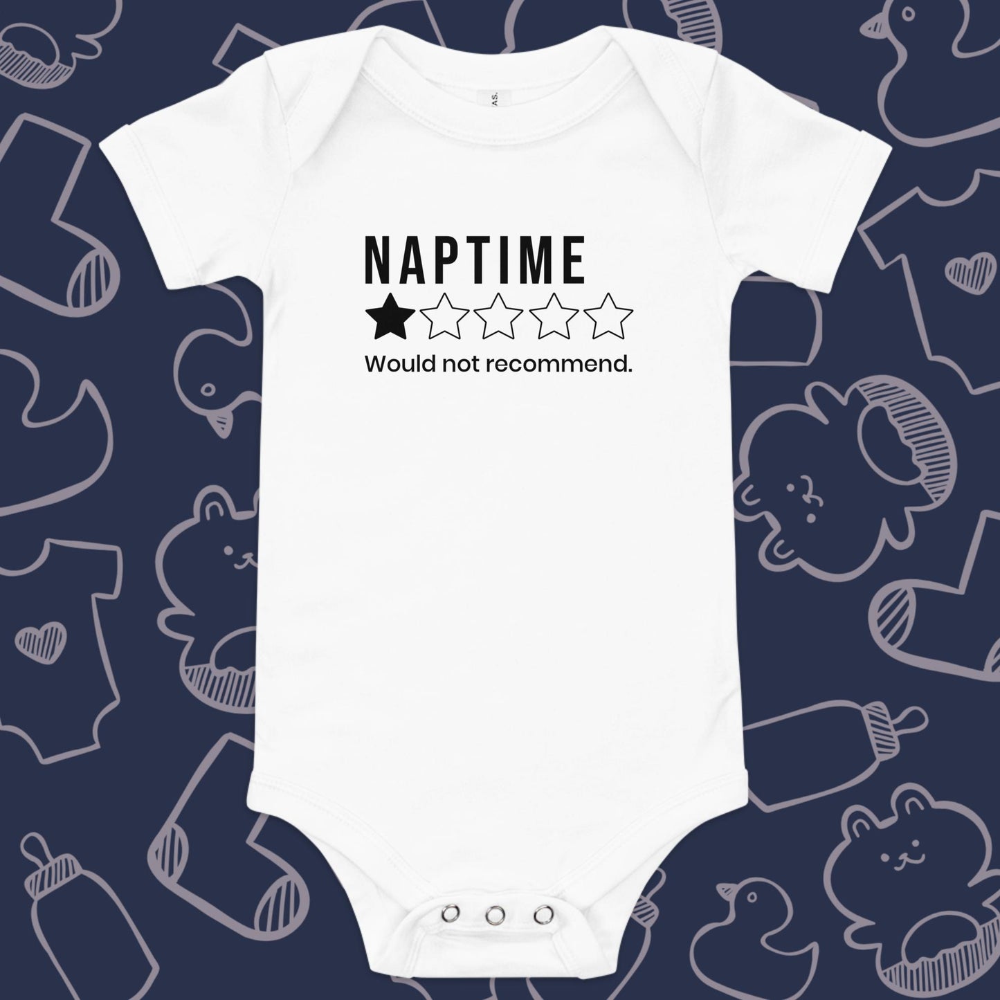Funny, white baby onesie featuring a one star rating and the playful text "NAPTIME WOULD NOT RECOMMEND." against a whimsical, blue backdrop of ducks, socks, stuffed animals, baby bodysuits, and bottles