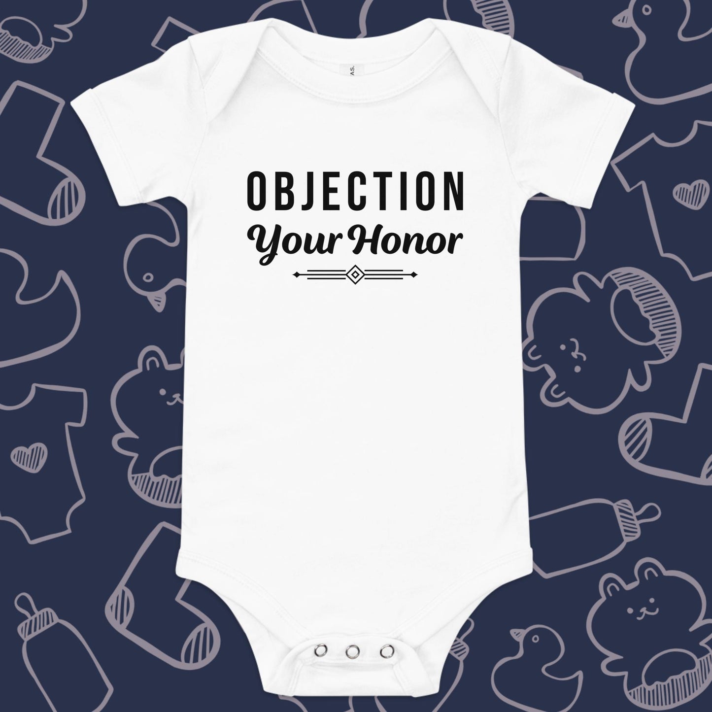 Funny, white baby bodysuit featuring the playful text "OBJECTION Your Honor" underlined against a whimsical, blue backdrop of baby toys, bodysuits, and bottles.