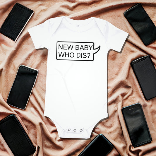 White baby bodysuit with "NEW BABY WHO DIS?" text in a speech bubble outline, on reddish-brown draped fabric surrounded by smartphone illustrations. A funny humorous baby clothes design playing on a modern phrase for a new arrival or baby shower gift from Born Brash.