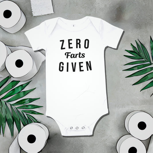White baby bodysuit with "ZERO Farts GIVEN" text on a gray background with toilet paper and palm leaf illustrations. A funny humorous irreverent baby clothes design about farts and not caring, a great baby shower gift from Born Brash.