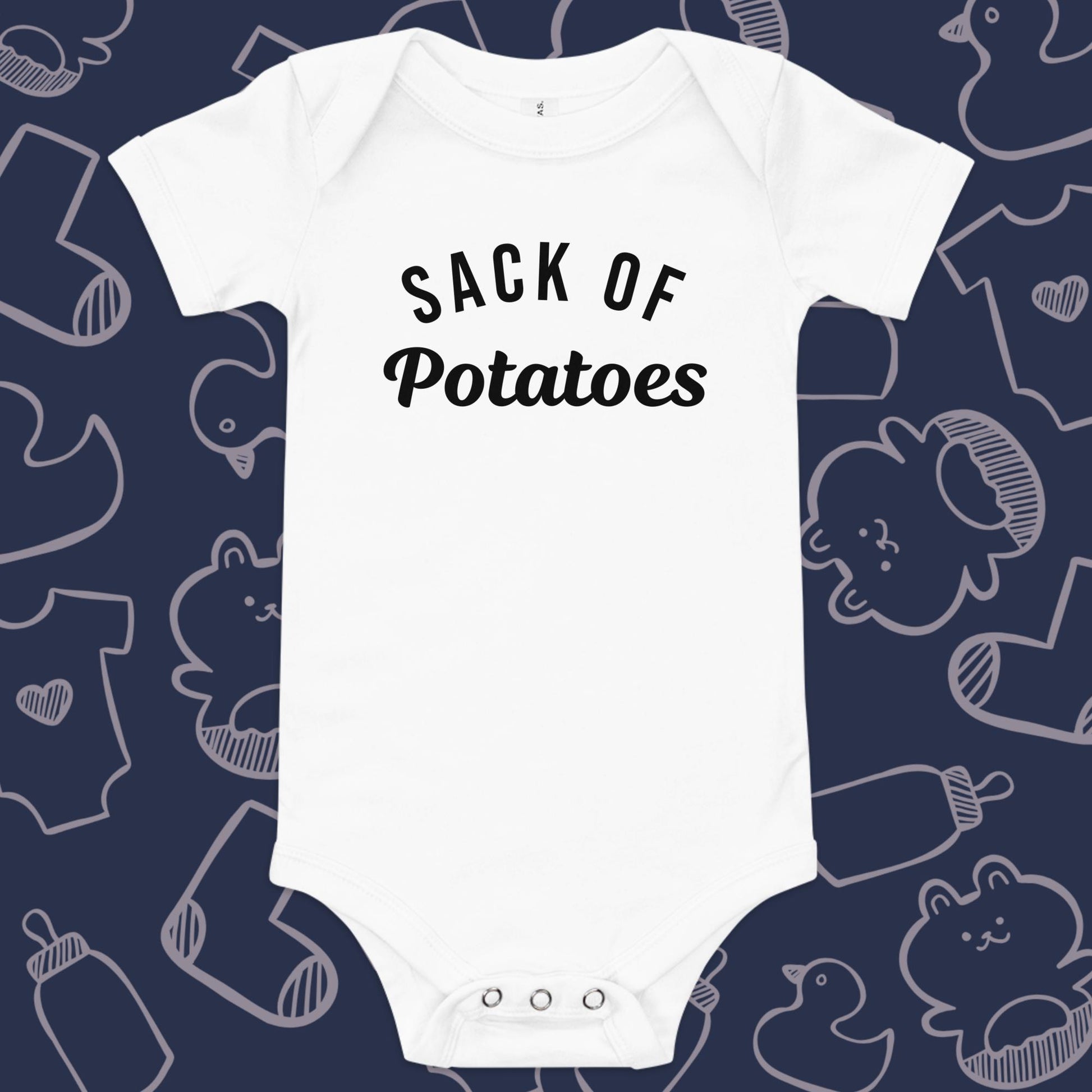 Funny, white baby bodysuit featuring the playful text "Sack of Potatoes" against a whimsical, blue backdrop of baby toys, bodysuits, and bottles.