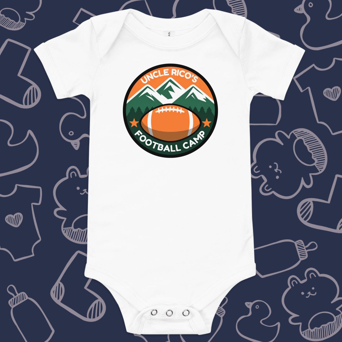 Funny, white baby bodysuit featuring the playful text "Uncle Rico's Football Camp" within a picture of mountains and a football against a whimsical, blue backdrop of baby toys, bodysuits, and bottles.